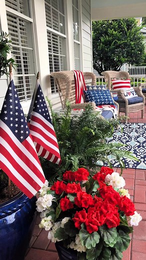 The front porch is all ready for the Fourth of July! How about you? All ready to celebrate? #fourthofjuly #4thofjuly #patrioticdecor #patrioticporch | Celebrate & Decorate