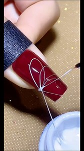 10K views · 48 reactions | ✨ String drag nail art looks simple, but technique matters With the right gel and good hand control, you can create soft, elegant patterns. Perfect for floral, line art, and abstract designs ✨ #reelsfacebook #nailart #nailsdesign #diynails #nailinspo | Stylish Nail Art Designs | Facebook