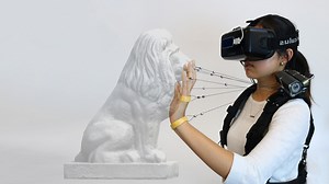 This VR system tethers your hands to your shoulders to improve haptics - Engadget