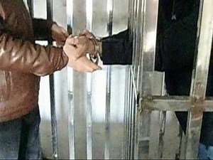Welding permanent shackles onto prisoner