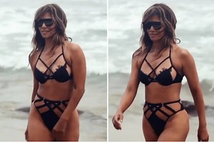 Halle Berry walks the beach in a tiny bikini after celebrating her 54th birthday