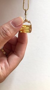 Inspired by antique spinner charms, the word "ABUNDANCE" is...