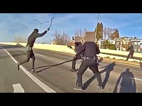 Suspect Lunges at Reno Officers With Tow Chain Before Being Shot