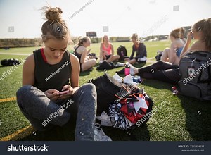 Teenage Girl High School Cheerleader Texting Stock Photo 2221914037 | Shutterstock