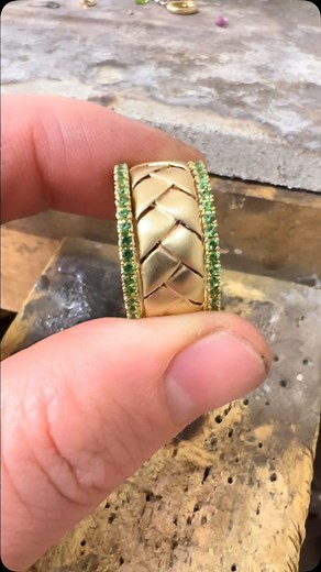 This satin finished origami band looks delicious paired with these candy colored Tsavorite garnet spacer bands. #origami #handmadejewelry #delicous #finejewelry #bostonjeweler #shopwoo #familyjeweler | M. Pope & Co. Fine Jewelers
