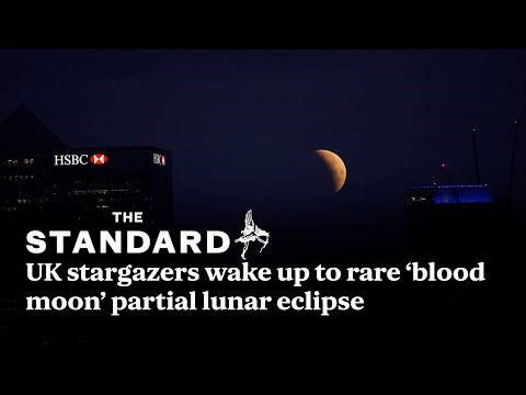 Blood moon: UK stargazers wake up to rare partial lunar eclipse