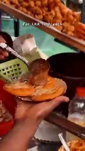 4.5K views · 88 reactions | A favourite among the locals, isso wade (deep fried prawn snacks) sold on Galle Face Green is a must-try. It might just become your favourite crispy snack too!  @raha.deen . . . #SoSriLanka #ExploreSriLanka #VisitSriLanka #SriLankaTourism #SriLankaTravel #SriLanka #IssoWade #SriLankaStreetFood | Tourism Sri Lanka | Facebook