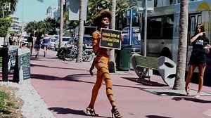 PETA's nude "Tiger" protests UniverSoul circus on Miami Beach