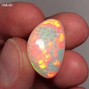 2.5M views · 10K reactions | Fire opals are SO cool... I could watch this all day  | UNILAD | Facebook