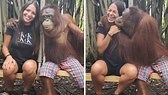 This monkey started giving hugs and kisses to this woman after taking pictures together! This was totally love at first sight! | Rumble