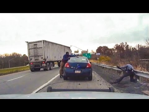 Dashcam shows shootout between suspect and police