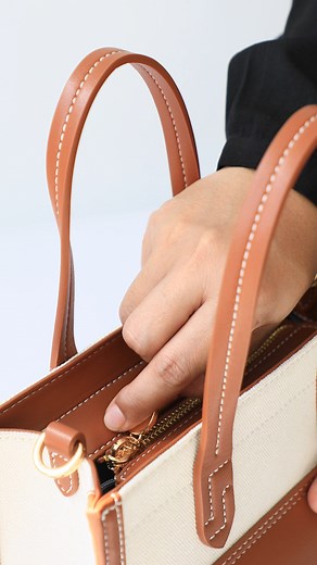 Worn on the shoulder, crossbody, or handheld, Emily Canvas Stitch-Trim Tote Bags are an essential on-the-go accessory. Art: 0603781-303S #SEMBONIAsustainability #sustainablefuture #sustainablestyle #atonewithnature #sembonia #spring #crossbodybag #satchel | SEMBONIA