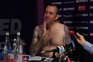 Mark Williams appears in towel after Betfred World Championship win