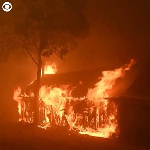 Firefighters were seen fighting flames as the Park Fire continued to burn in Butte County, California, on Thursday (7/25). Officials say structures have been destroyed and thousands were ordered to evacuate as the fire spread. According to authorities, a 42-year-old man was arrested for starting the fire after pushing a burning car into a gully. | CBS Newspath