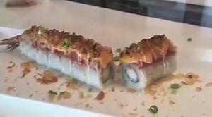 Check out our Hot Nights Roll ! A most popular roll of choice overseas. Crispy fried shrimp tempura roll topped with spicy minced tuna sashimi. Topped with more goodies - tempura crunchies and spicy mayo creme and chives. Then the whole thing is flame torched to add a perfect smoky grilled flavour! Purchase this whole roll pictured on www.sushisamurai.co ! Our customers love this premium sushi roll! | Sushi Samurai