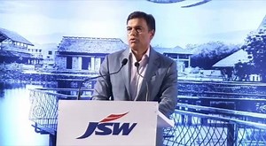 Mr Sanjay Gupta Chairman #APLApollo Ltd. being recognised by Mr Sajjan Jindal Chairman, JSW Group greeting in recently held JSW customers meet. | APL Apollo Tubes Limited