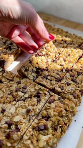 Homemade chocolate chip granola bars are so easy to make, you’ll wonder why you ever bought them in stores 🥸 #granolabars #recipe #yum | weelicious