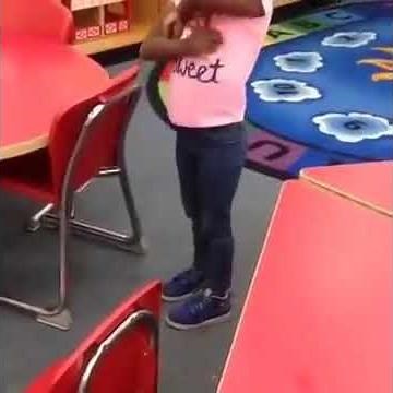 A FOUR YEAR OLD CHILD DESTROYS SCHOOL PROPERTIES.
