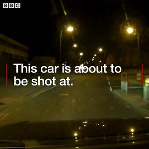 Couple shot at driving through Dunstable town centre. | BBC Beds, Herts & Bucks