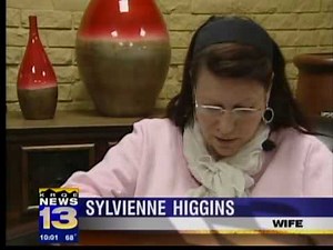 Higgins' wife says cops wrong