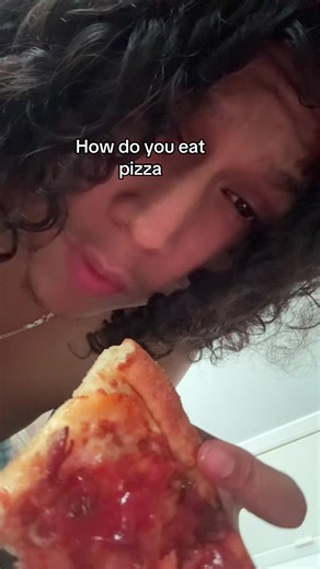 How do you eat pizza