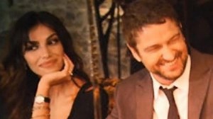 Gerard Butler 'happier' with Romanian model