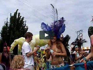 Fremont Parade: Topless Banner Holders Unroll The Banner