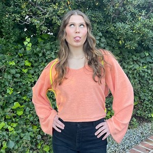 UO wide sleeve open back sweater