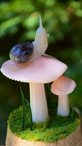 11K views · 430 reactions | Sculpting pink waxcaps & a snail friend!  Just wrapped up this commissioned sculpture jar  Made with polymer clay as usual! I always love a lil snail + mushie combo :) I'm teaching a local mushroom sculpting workshop here in Roswell, GA! One in September and one in October! Details in my bio  :) #mushroomart #fungiart #mushroommonday #mycologymonday | The Arcane Moth | Facebook