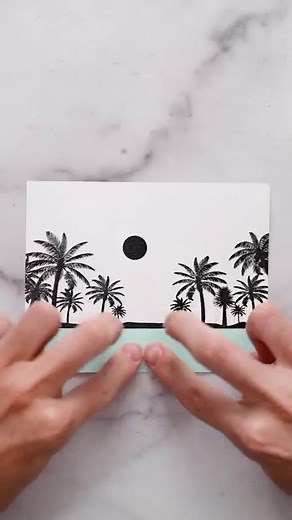 This tropical stamp for cardmaking is making me want a vacation!🌴 Follow @inklipse for more crafting inspiration. Here, I stamped the palm tree stamp from the new Treescapes stamp set. I set the stamped image in place using clear embossing powder. Then, I ink blended the background using Simon Hurley inks for intense color and a smooth blend! For the sky, I used shooting star, prom queen, crown me, and no diving. This creates a gorgeous blend!😍 #asmr #asmrsounds #crafts #art #cardmaking #stamp