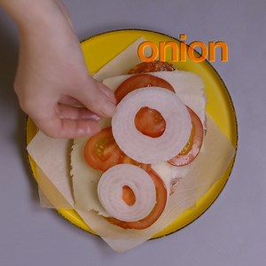 A classic Mexican torta is served on an oblong roll and can be eaten...