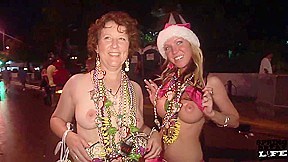 Flashing on Duval Street During Fantasy Fest - SpringbreakLife