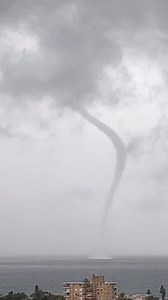 A barrage of rain and intense thunderstorms swept over Sydney and surrounding areas of central eastern NSW on Tuesday night, triggering flash flooding, damaging winds and even a waterspout. 😱 Full story > https://tinyurl.com/3bjsb5xa 🎥 Waterspout seen in Dee Why, NSW. Video via @mpayney/IG | Weatherzone
