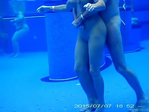 Underwater sex in the pool at the nudist resort - watch on VoyeurHit.com. The world of free voyeur video, spy video and hidden cameras