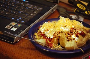 Americans need to stop multitasking while eating alone, argues French sociologist Claude Fischler