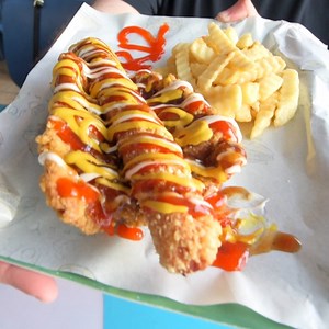 632K views · 1.3K shares | This fried hot dog has a fried chicken bun! | Insider Food | Facebook