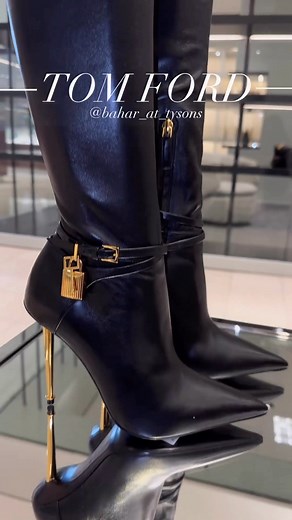 12K views · 488 reactions | These thigh-high booths by @tomford ooze sex appeal with black leather and gold hardware including heel and padlock charm. Priced at $3,490, shop now via the link in bio. Hot! Or Hmm…? * #tomford #bombaccessories #fashionbombdaily  @bahar_at_tysons Blogged by @limo_x | Fashion Bomb Daily | Facebook