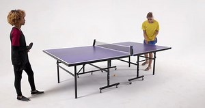 clip-3702700201-multiracial-female-table-tennis-players-passing-ball