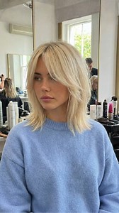 514K views · 528 reactions | Platinum hair perfection—bright, creamy blonde paired with soft movement and wispy butterfly bangs that frame the face beautifully. This cut keeps things light, modern, and effortless while adding shape and softness around the front. Polished without feeling heavy, bold without trying too hard ✨ #fblifestyle | Colored Hair Care | Facebook