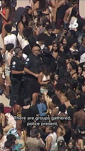 Massive spring break crowds take over Florida beach