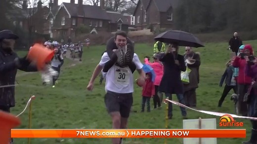Dozens of couples in the UK have taken part in the 13th annual wife-carrying championships, braving cold and soggy conditions to complete the 380 metre course in Surrey. The prize? A barrel of ale. | Sunrise