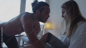 Couple plays around in hotel room