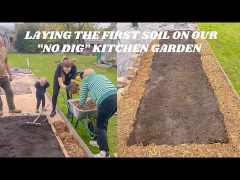 LAYING THE FIRST SOIL ON OUR NO-DIG KITCHEN GARDEN