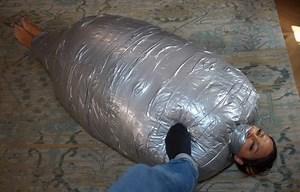 Rara Curves - A thick duvet and duct tape mummification cocoon, Muffled Screams at Bondage M/F - Download or watch online Bondage Video | bondage-me.cc