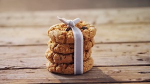 Stack of chocolate cookies tied with ribbon 4k | Premium Stock Video Footage