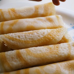 110K views · 2.7K reactions | Incredibly Delicious Patishapta Recipe | Janatar Ranna Ghor | Facebook