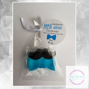 Little Man Baby Shower Favor - Boy Gender Reveal Party, Bow Tie & Mustache Theme Custom Made Optional Tags and Bags, Pack of 10 for just $28.99. Order here https://www.etsy.com/listing/613467447/little-man-baby-shower-favor-boy-gender #IMustacheYou #LittleManShower #MustacheSoap #MustacheBabyShower #BabyShowerFavors #BowTieBabyShower #PaperPartySupplies #ForABabyShower #BowTieSoap #GenderReveal | Amy's Bubbling Boutique, Inc. | Facebook