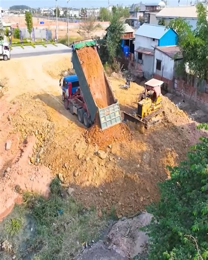 2.8K views · 53 reactions | Next Level Process!!! Land Filling Process by the Komatsu D31P Bulldozer Heavy Equipment Team Pushing Soil & Dump Truck Unloading Soil | Bulldozer Operator | Facebook