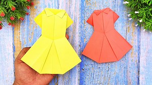 5.8K views · 18 reactions | Making Paper Clothe For School Projects | Origami wedding dress | How To Make An Origami Paper Dress Paper Things Without Glue | How to Make Paper Dress #PaperThinks #MakingPaperClothe #PaperDress | Entertaining Arts | Facebook