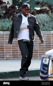 Rapper 50 Cent leaves the "Chelsea Lately" show studios with his arm in a cast after filming a spoof video alongside Internet sensation Keenan Cahill for Chelsea Handler's show. 50 Cent, who is reported to be dating Handler, filmed the video for his song "Down On Me" at the studio before Cahill's appearance on the show. Handler and 50 Cent were reportedly spotted out together in New Orleans in early October and have been seen out in LA together several times since. Both have denied a romance. Lo